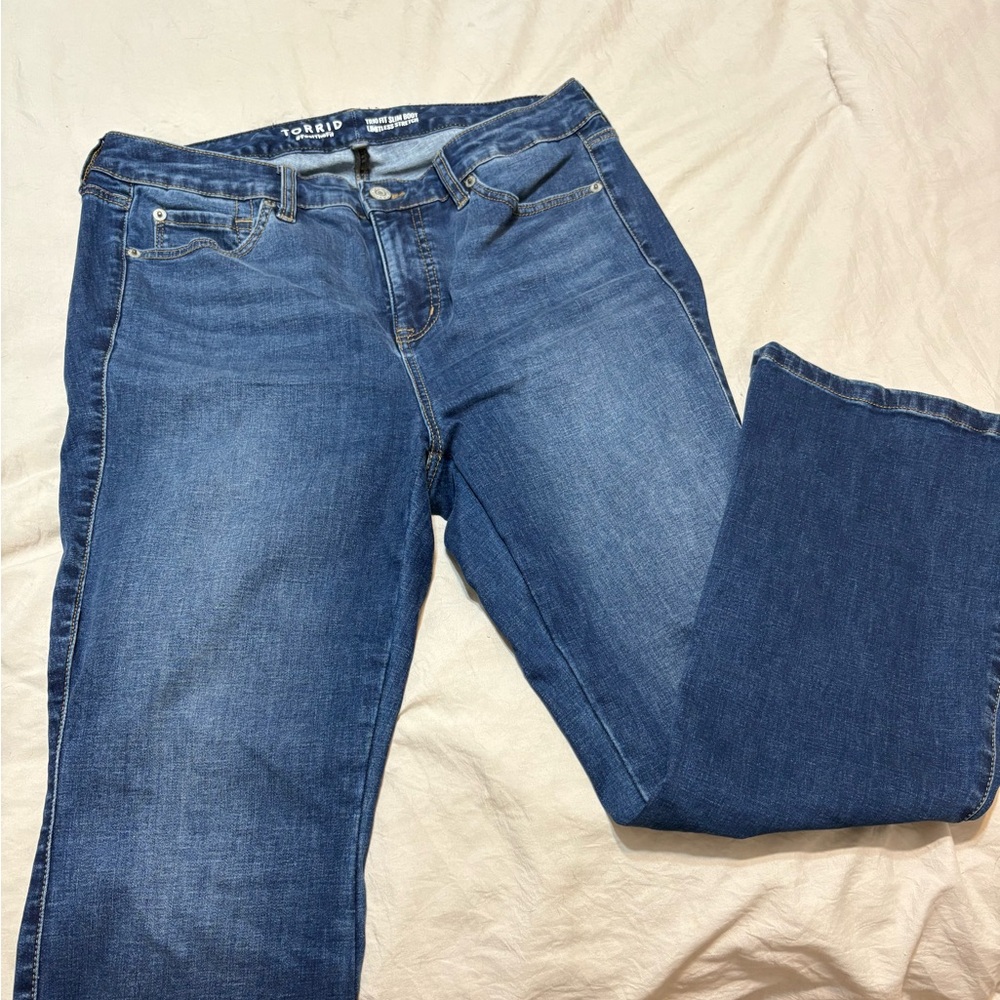 Torrid Blue Boot Cut Jeans with Modern Detailing